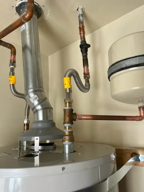 Water heater installation and plumbing repair in De La Plaine Manor